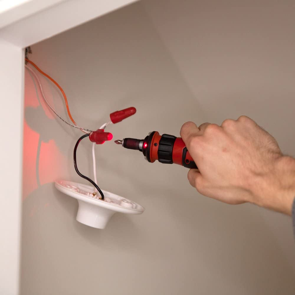 Rechargeable cordless screwdriver with circuit sensor technology. Includes 45-piece bit set.